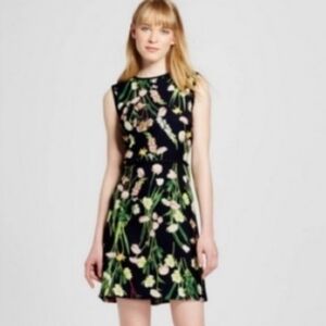 Victoria Beckham Sleeveless Dress with Botanical Print.